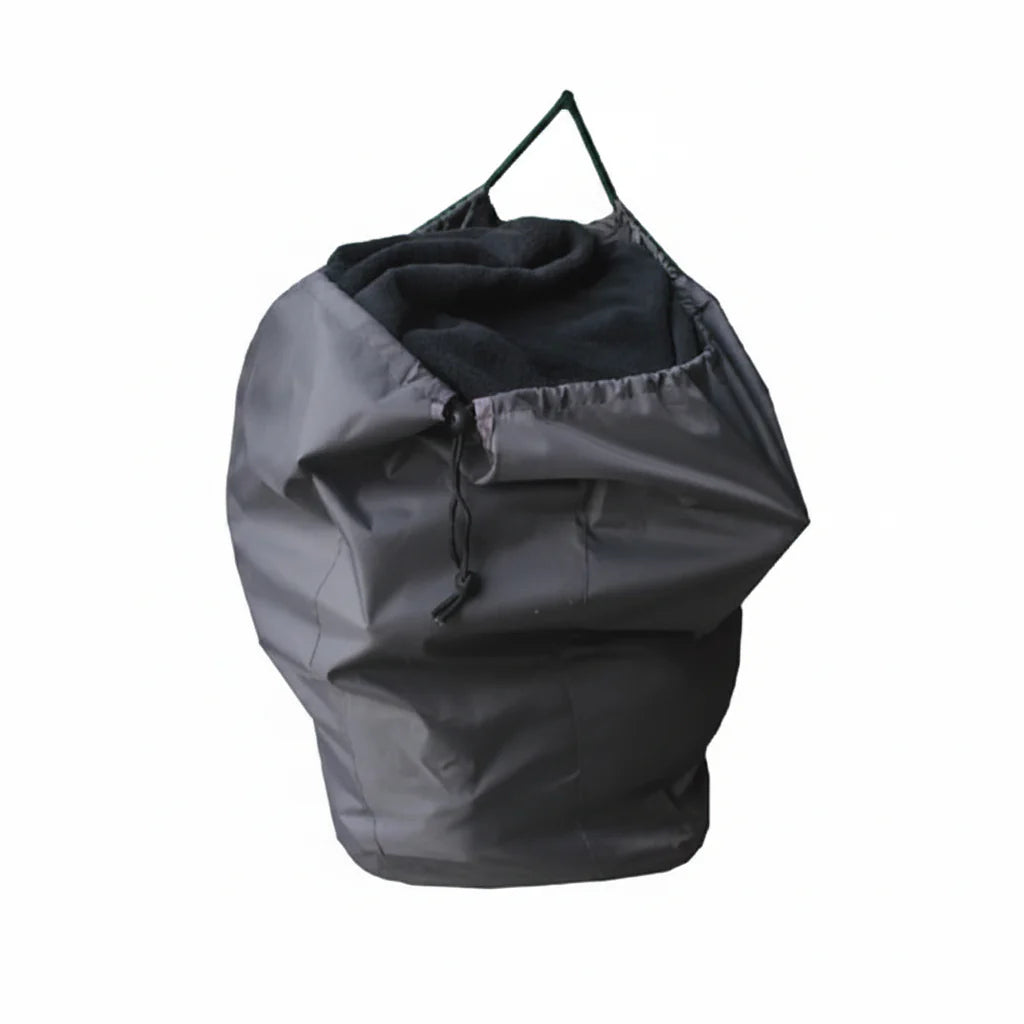 Black trash bag with a handle on a white background