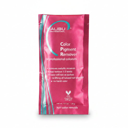 A single sachet of Malibu Professional Color Pigment Remover hair color remedy, featuring a metallic pink packaging with teal and white text and graphics.