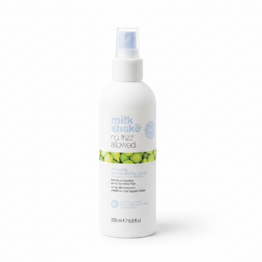 Milk Shake anti humidity hair product spray bottle on a white background