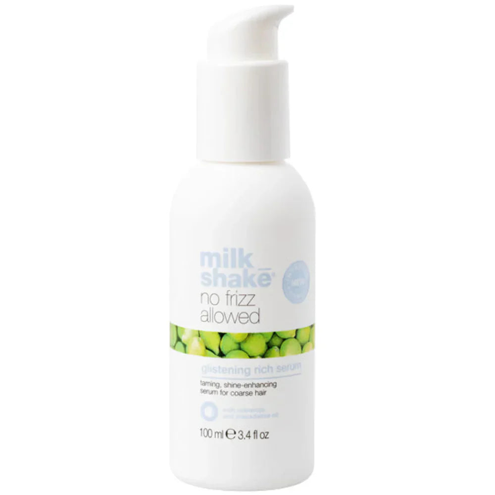 White bottle of 'milk shake no frizz glistening rich serum' product with green label on a white background