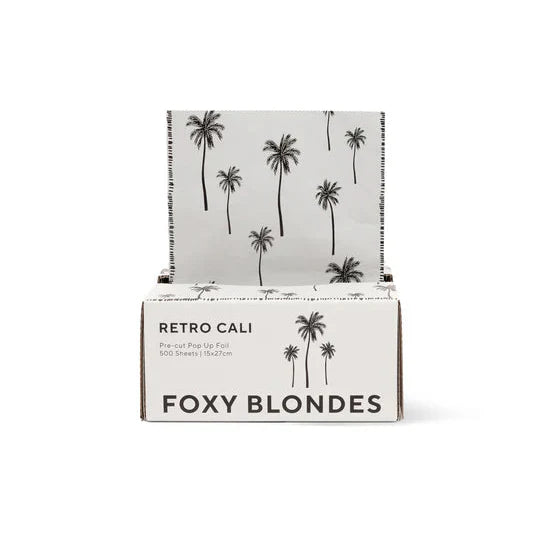 Foxy Blondes product packaging with palm tree design on a white background