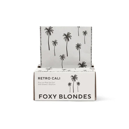 Foxy Blondes product packaging with palm tree design on a white background