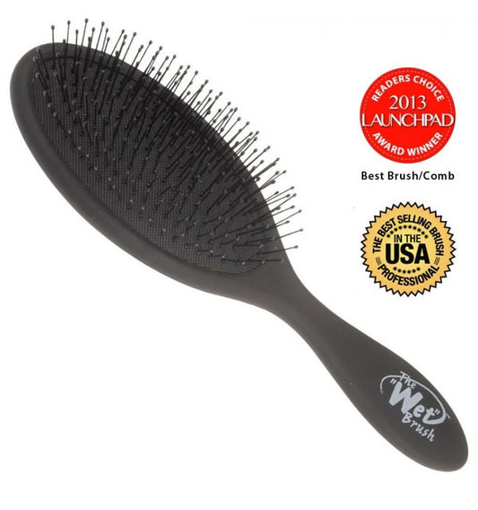 A black detangling hair brush with bristles and a handle, featuring a 'Reader's Choice' award badge and a 'Best Selling Prod' badge.