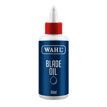 Wahl Blade Oil bottle with blue label and red cap on a white background