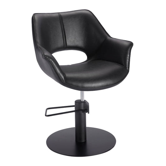 Black leather salon chair with adjustable base on a white background
