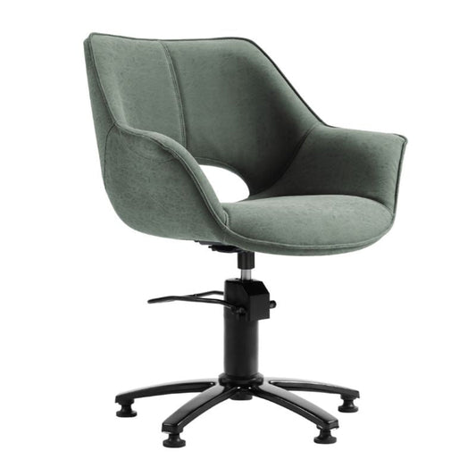A modern upholstered salon chair with a curved, high-back seat in a muted sage green fabric, supported by a black five-star swivel base with casters, shown against a plain white background.