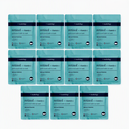 Twelve identical teal and navy single-use retinol + vitamin C eye mask packets arranged in a grid on a plain white background.