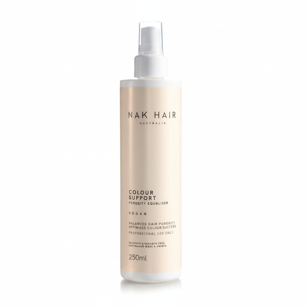 A 250ml bottle of NAK HAIR Colour Support Vegan Porosity Equaliser spray on a clean white background.