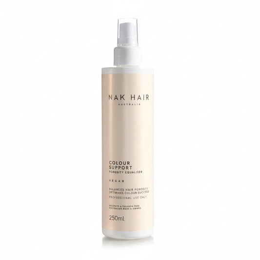 A 250ml bottle of NAK HAIR Colour Support Vegan Porosity Equaliser spray on a clean white background.