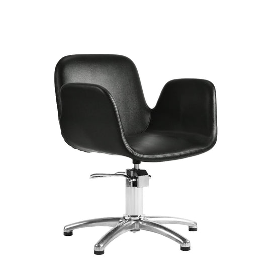 A modern black salon chair with a contoured seat and back, upholstered in black faux leather, mounted on a chrome-plated five-star swivel base with black casters, shown against a plain white background.