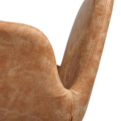 Close-up of a curved upholstered salon chair back in a warm tan or camel suede-like fabric against a plain white background.